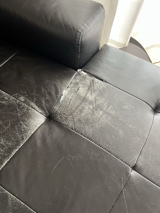 Sofa em pele com estragos