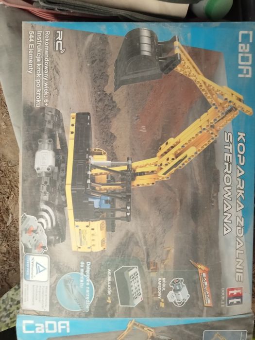 Koparka zdalnie sterowana iładowarka z Technik