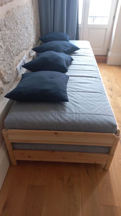 Stackable bed with foam mattresses