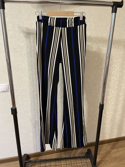 штани кльош у смужку