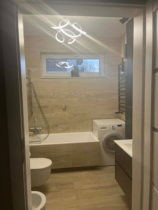 Apartament - 3 pokoje z ogródkiem i miejscem parkingowym w garażu