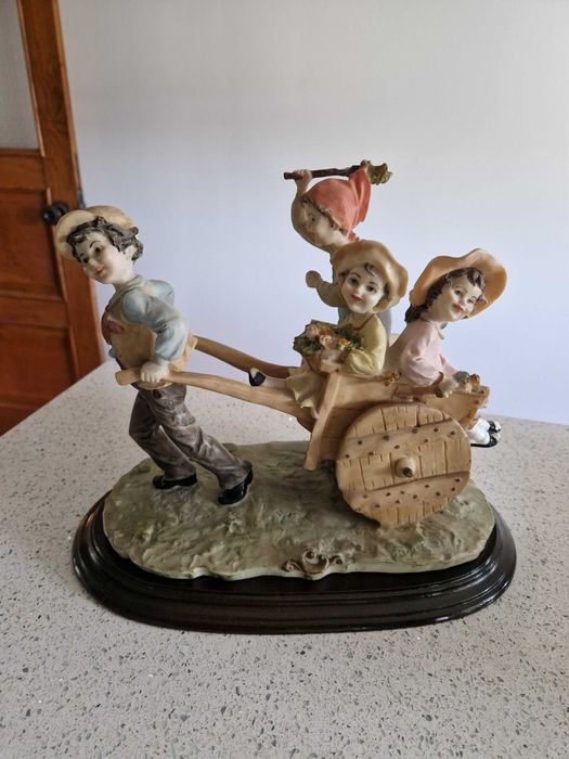 Boneco em marfinite genuíno vintage com data e assinatura