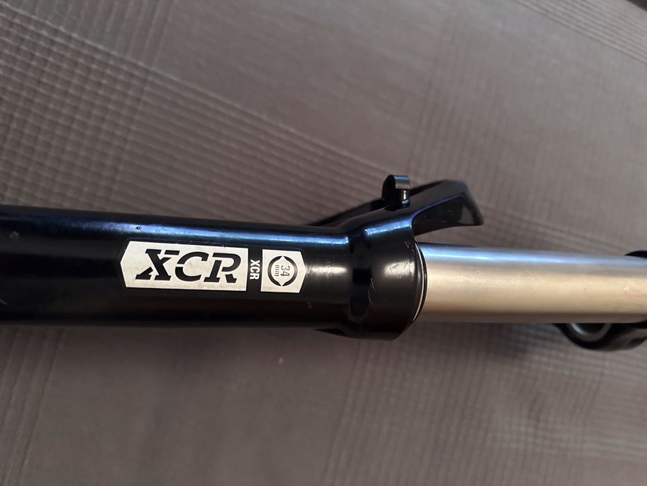 Suspensão SR Suntour XCR34 15x110