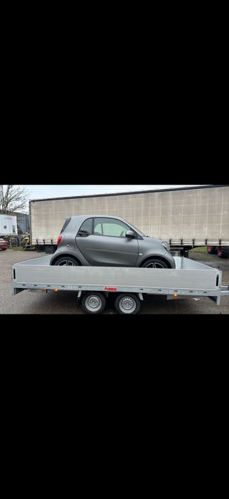 Atrelado de carga e porta automoveis