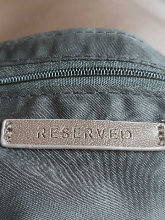 Жіноча сумка з довгою ручкою.
Reserved