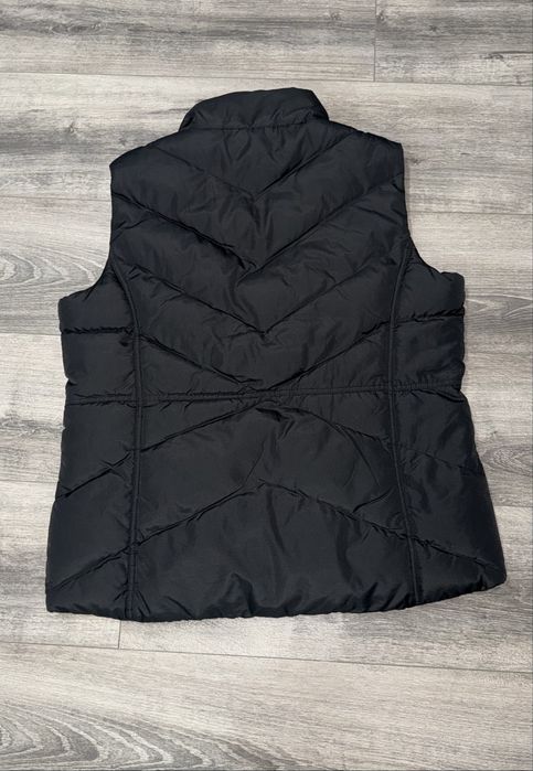 Жіноча чорна желетка