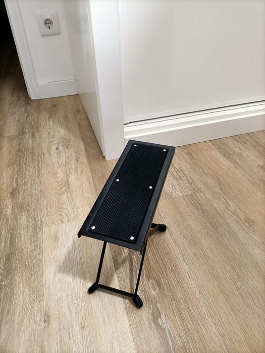 Apoio de pé para guitarra