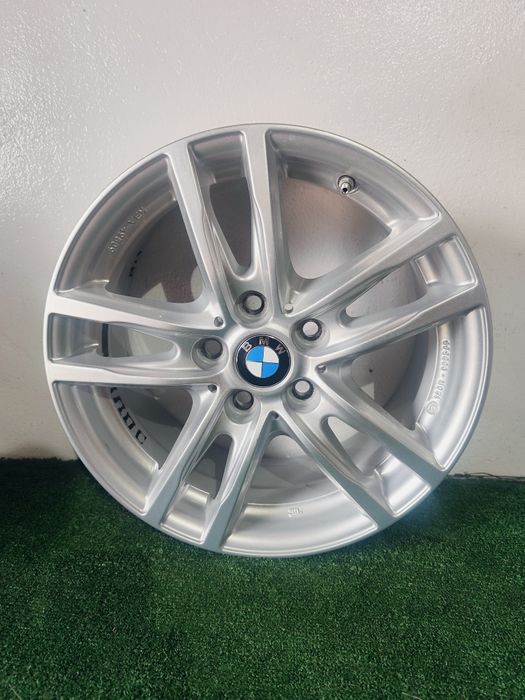 Felgi aluminiowe BMW 1-3-x1 5x112-et52-7J-16"- stan bdb TPMS