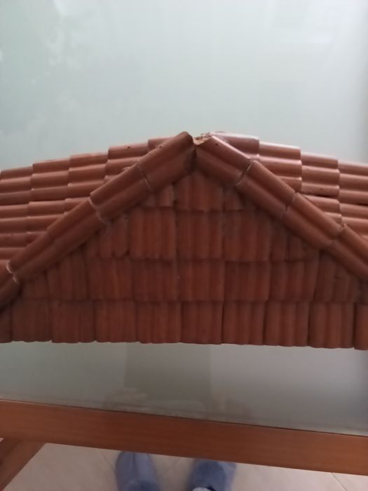 Miniatura de casa  rural latino americana em artesanato