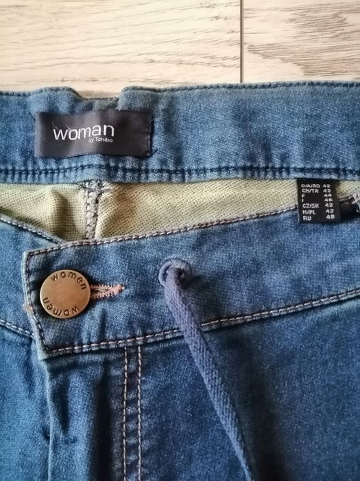 Spodnie damskie bawełniane Tchibo stylizowane na jeans.