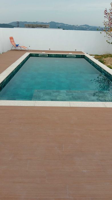 Construcao de piscinas churrasqueiras manutenção de jardins
