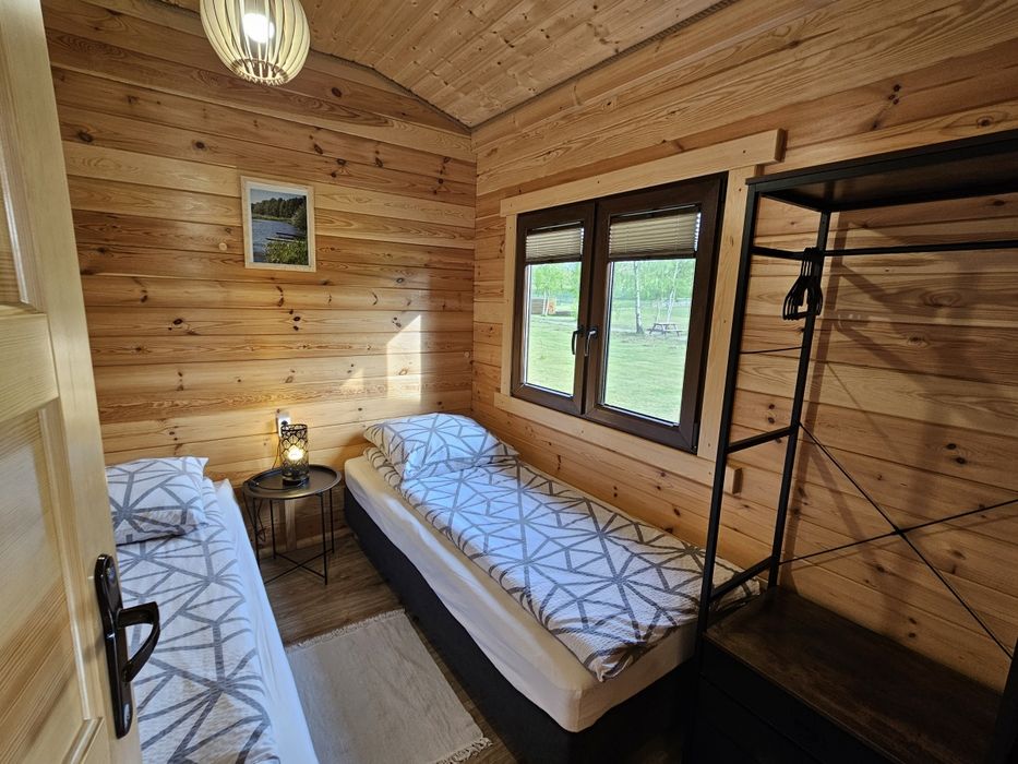 Domki letniskowe Przy Leśniczówce - Sauna - Jacuzzi - Domki nad jeziorem- Bory Tucholskie- Kaszuby, rodzinny wypoczynek, plac zabaw, stawy