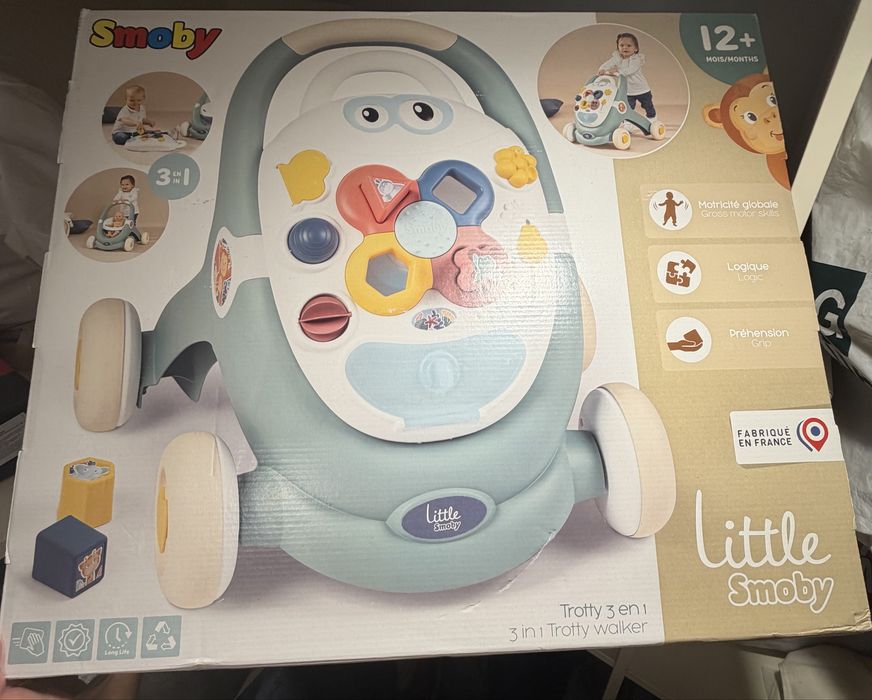 Дитячі  ходунки-каталку Smoby Little Smoby Trotty 3 в 1 у гарному стані.