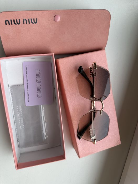 Окуляри сонцезахисні miu miu