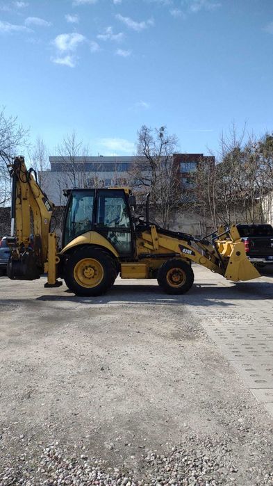 Koparko ładowarka CAT 428E