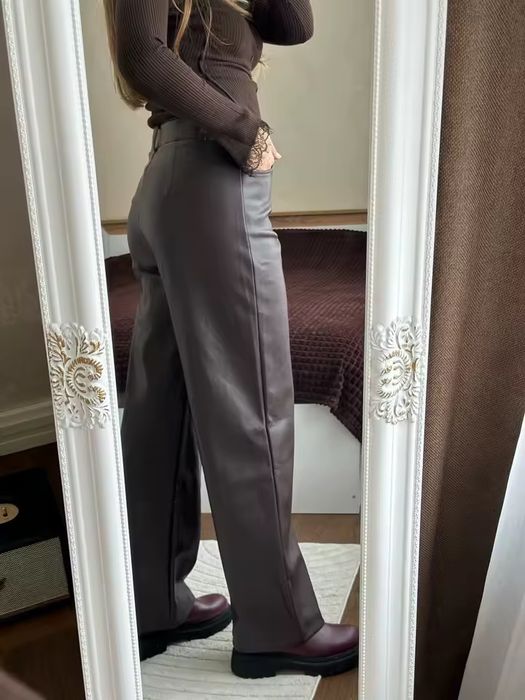 Шоколадні шкіряні штани на тонкому флісі