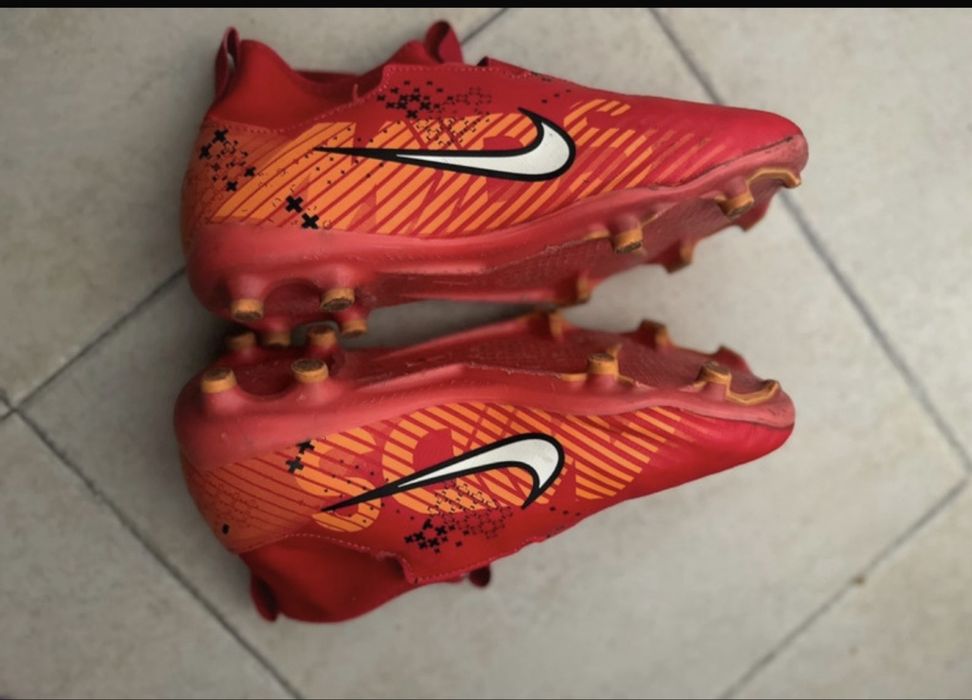 Chuterias bota nike quase novas