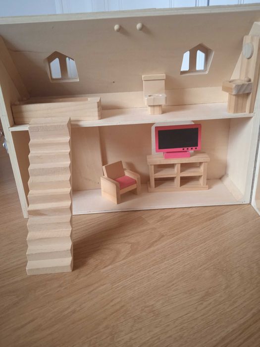 Casa de bonecas portátil