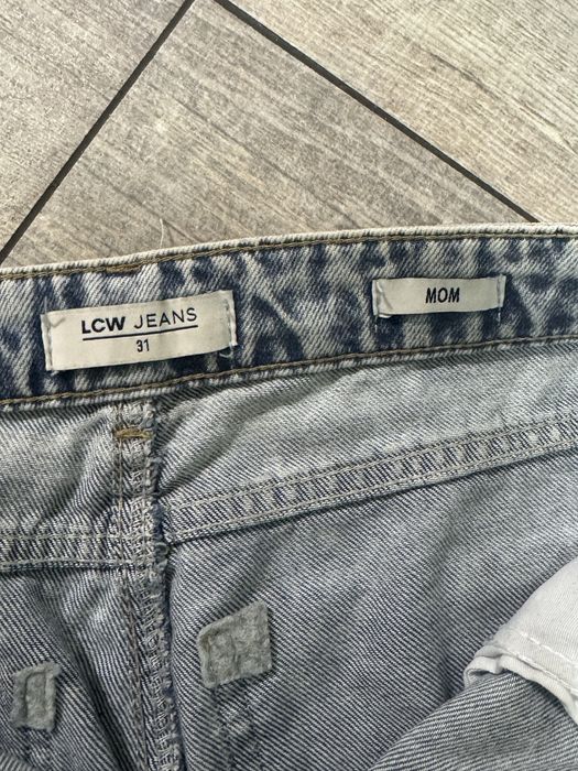 Джинси блакитні, порвані