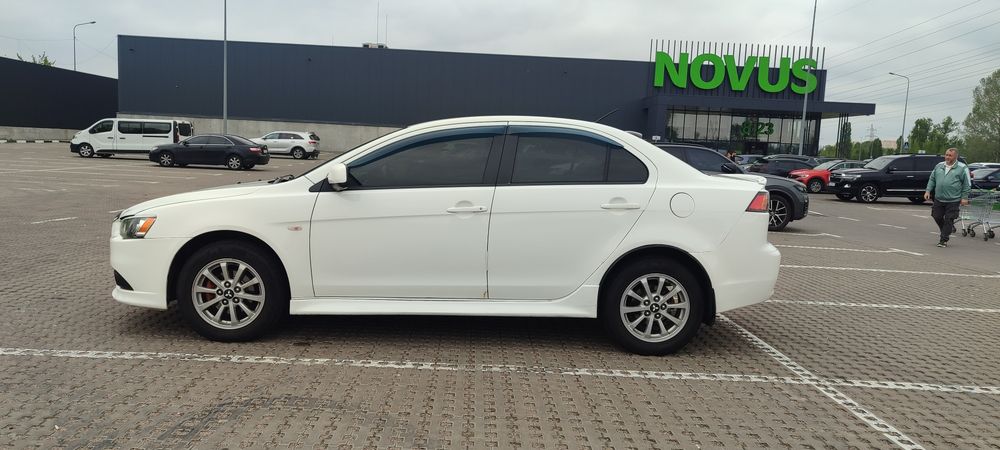 Mitsubishi Lancer 2012 VIN JMBSRCY1ACU005542 фото оголошення 7 з 12