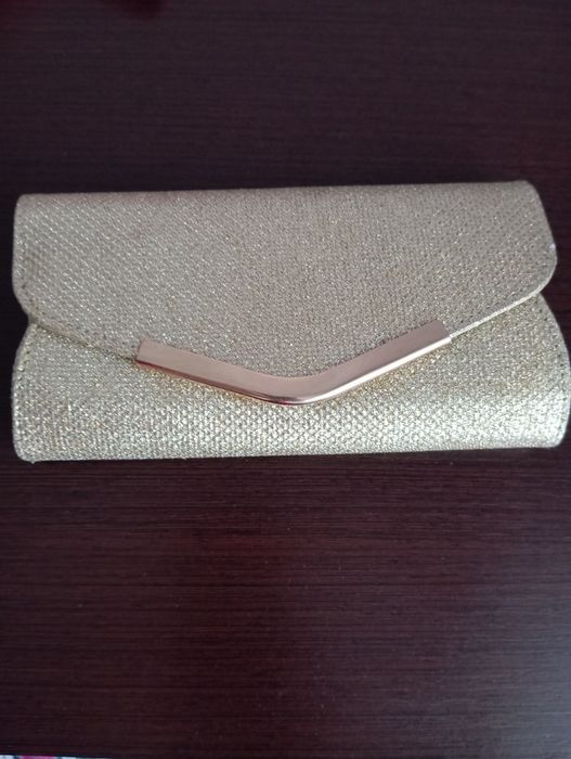 Продам кошелек золотой