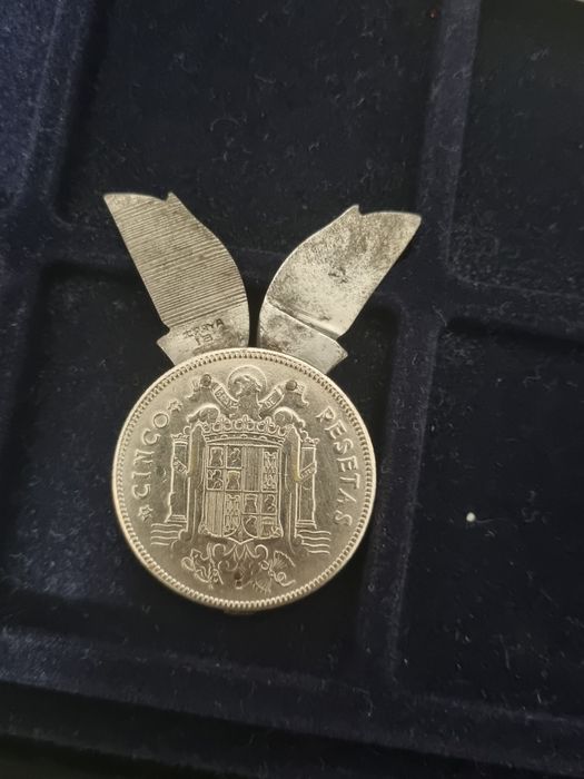 Moeda que é uma navalha