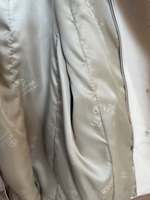 Skórzany płaszcz firmy Elegancja