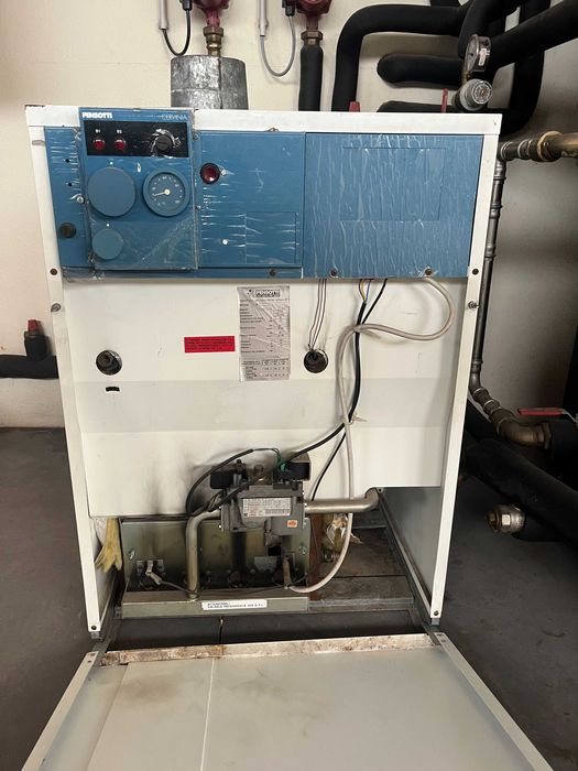 Caldeira de aquecimento a gás e permutador de calor