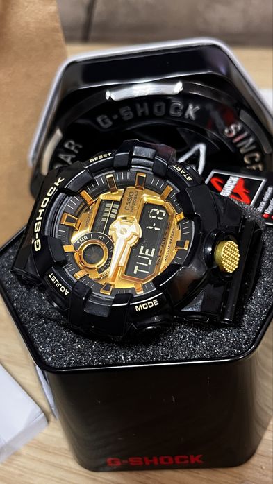 G shock preto e dourado