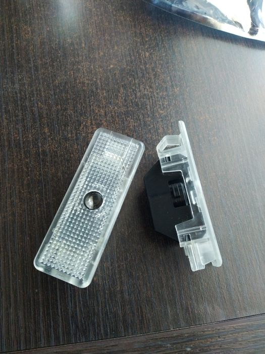 Подсветка дверей с логотипом БМВ