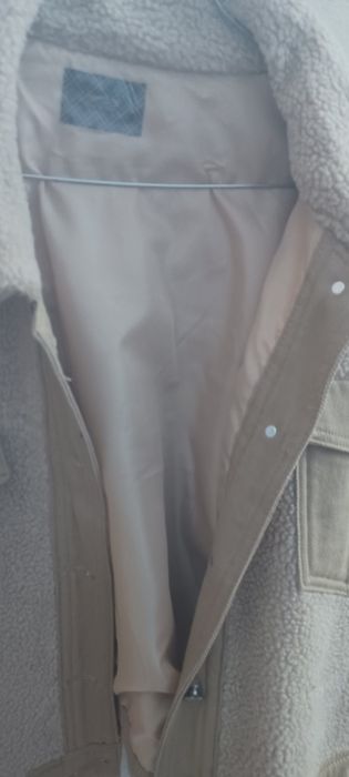 Blusão em borreguinho NOVO, tam unico  boa qualidade, Todo forra