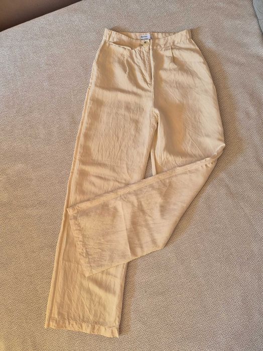 Lniane spodnie z szeroką nogawką Bershka.36