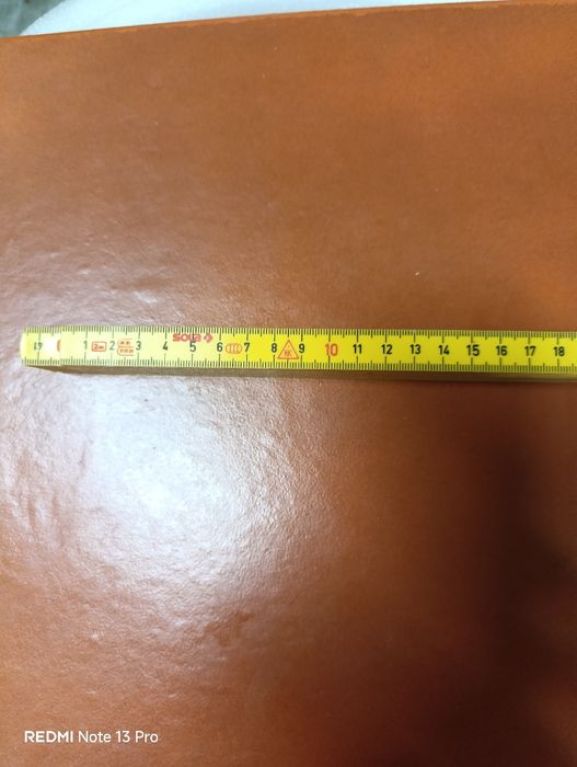 Metro articulado sintético.