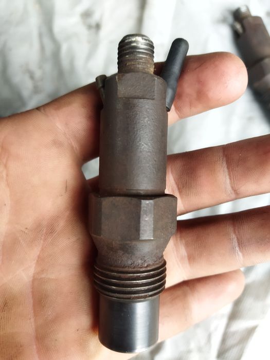 Форсунки від мотора форд ескорт 1.6 дизель