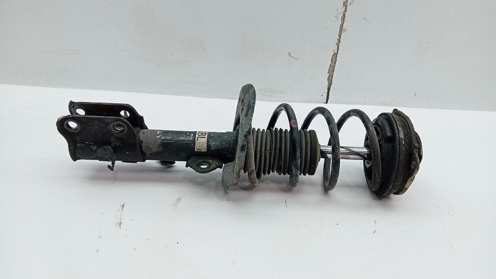 Amortecedor frente esquerdo NISSAN Pulsar Hatchback (C13)