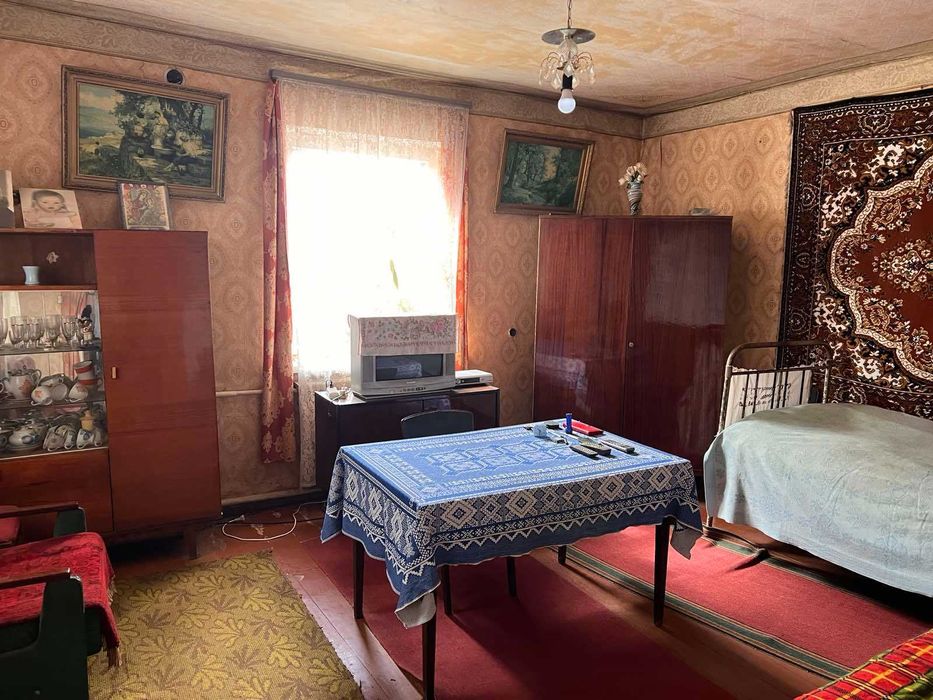 Продам 1/2 будинка в м.Богодухові