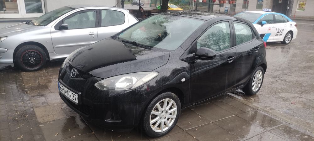 Mazda 2. 1,4 16v klima OC na rok