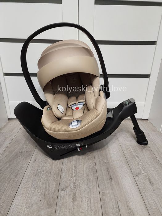 Розкладне автокрісло Cybex Cloud T plus i-size Cozy beige Сайбекс бежеве