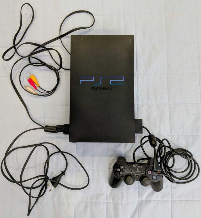 Playstation 2 + jogos + 1 comando + cartão de memória