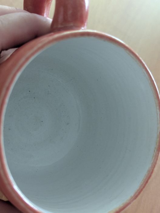 Nowy, ceramiczny kubek z uchem
