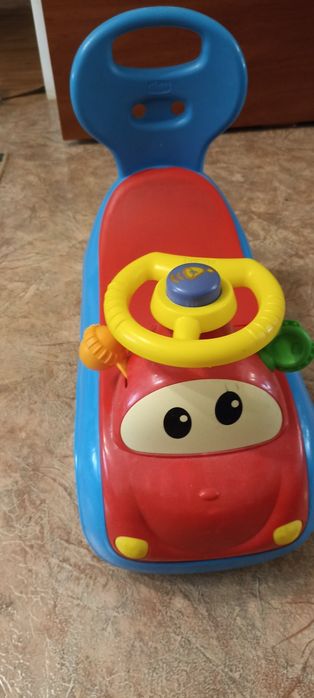 Машинка толокар дитяча