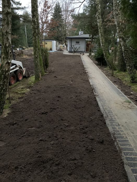 Usługi z miniładowarka Bobcat 543 transport LT46 z wywrotka