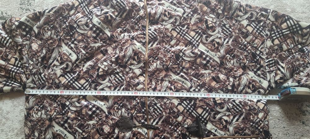 Płaszcz firmy Minouu