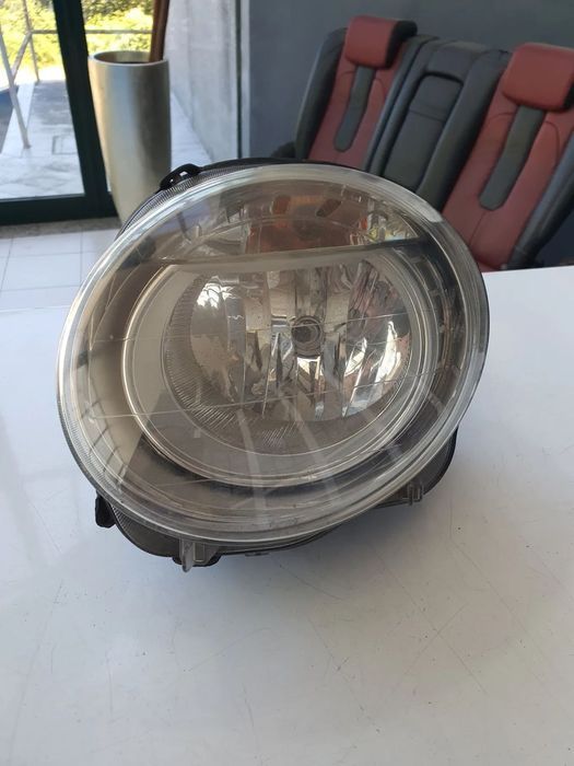 FAROL ESQUERDO FIAT 500 / 455507481 / APOIOS PARTIDOS