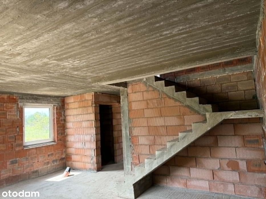 Nowoczesny dom w zabudowie bliźniaczej – 167 m² z garażem i poddaszem.