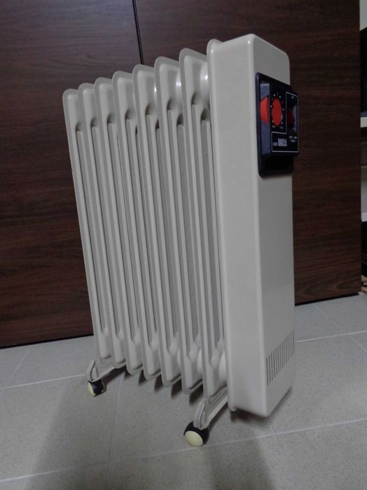 Aquecedor eléctrico a óleo