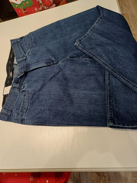 Nowe spodnie męskie niebieski jeans Brühl rozm XL (52)