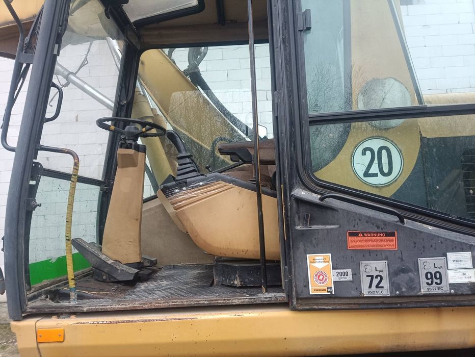 Екскаватор Caterpillar M312