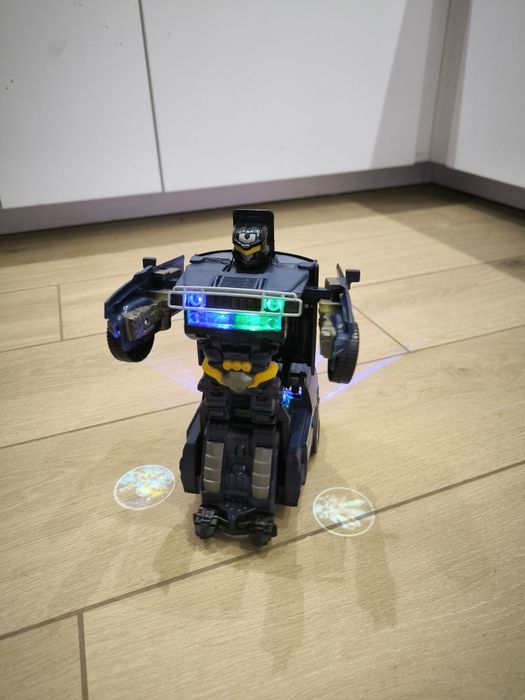 Prezent święta NOWY. Mikołaj Interaktywny pojazd policyjny policja dla dzieci Transformers świeci