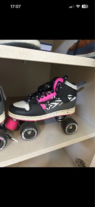 Patins oxelo cor de rosa e pretos